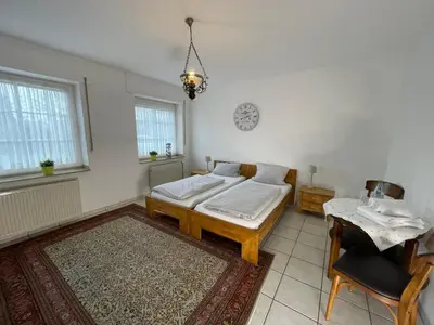 Ein Bett oder Betten in einem Zimmer der Unterkunft Landhaus Holthausen