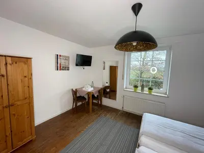 Ein Bett oder Betten in einem Zimmer der Unterkunft Landhaus Holthausen