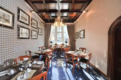 Ein Restaurant oder anderes Speiselokal in der Unterkunft Boutique Hotel Windsor - The Charming City Hotels