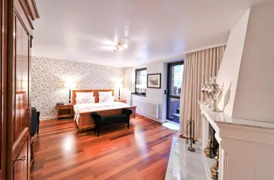 Ein Bett oder Betten in einem Zimmer der Unterkunft Boutique Hotel Windsor - The Charming City Hotels