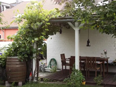 Ein Garten an der Unterkunft Haus Rothenstein, ruhige FeWo, ca. 10 min. zu Messe und Flughafen