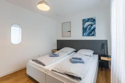 Ein Bett oder Betten in einem Zimmer der Unterkunft Glück Auf Appartements Lösorter Straße Duisburg