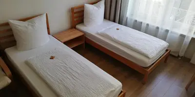 Ein Bett oder Betten in einem Zimmer der Unterkunft Hotel Hanseatic-garni