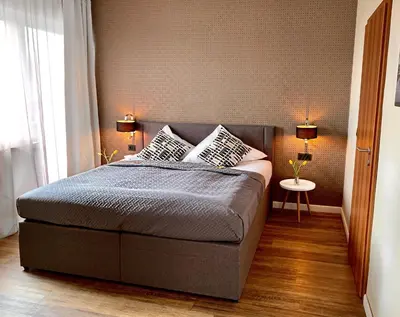 Ein Bett oder Betten in einem Zimmer der Unterkunft Hotel Akazienhof