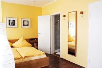 Ein Bett oder Betten in einem Zimmer der Unterkunft Hotel Akazienhof