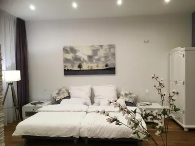 Ein Bett oder Betten in einem Zimmer der Unterkunft City-Apartment Ohligs