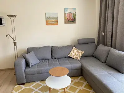 Ein Sitzbereich in der Unterkunft Lichtdurchflutetes Apartment mit Blick ins Grüne
