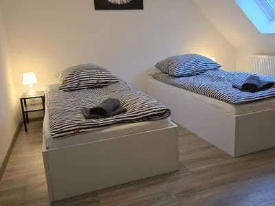 Ein Bett oder Betten in einem Zimmer der Unterkunft Flora Modern Living Apartment