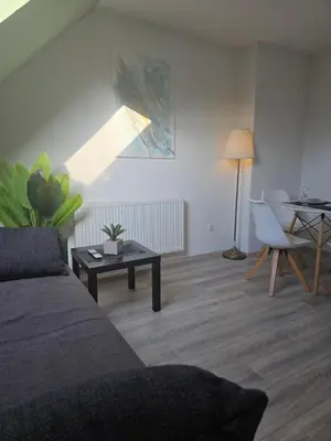 Ein Sitzbereich in der Unterkunft Flora Modern Living Apartment