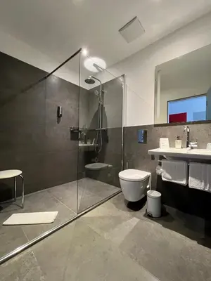 Ein Badezimmer in der Unterkunft Campushotel