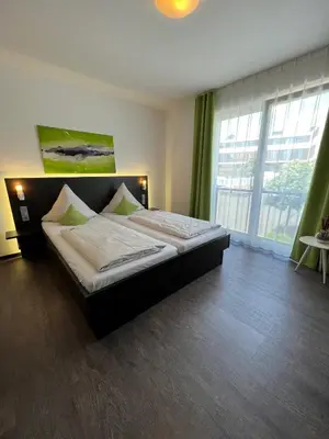 Ein Bett oder Betten in einem Zimmer der Unterkunft Campushotel
