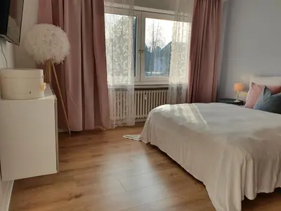 Ein Bett oder Betten in einem Zimmer der Unterkunft Harmony Apartment