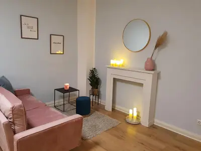 Ein Sitzbereich in der Unterkunft Harmony Apartment