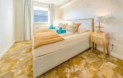 Ein Bett oder Betten in einem Zimmer der Unterkunft 2 Bedroom Cozy Apartment In Mettmann