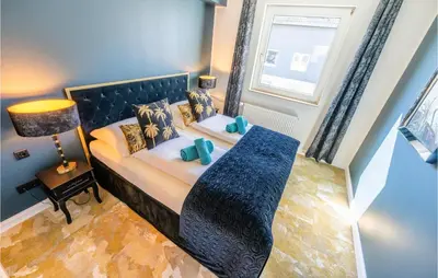 Ein Bett oder Betten in einem Zimmer der Unterkunft 2 Bedroom Cozy Apartment In Mettmann