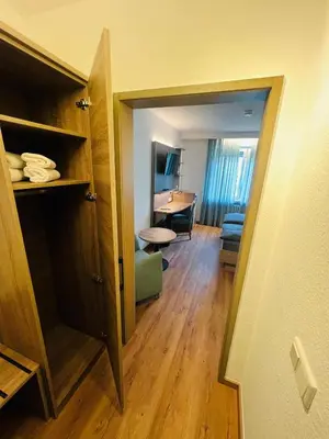Ein Bett oder Betten in einem Zimmer der Unterkunft Hotel Dülmener Hof