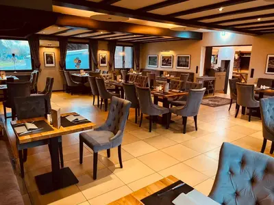 Ein Sitzbereich in der Unterkunft Hotel Dülmener Hof