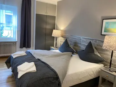 Ein Bett oder Betten in einem Zimmer der Unterkunft Haus Berlin