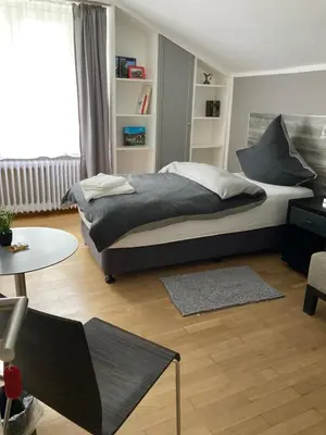 Ein Bett oder Betten in einem Zimmer der Unterkunft Haus Berlin