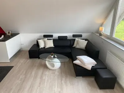 Ein Sitzbereich in der Unterkunft Ferienwohnung Olli Koch