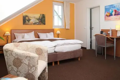 Ein Bett oder Betten in einem Zimmer der Unterkunft Hotel Fürstenberg