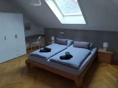 Ein Bett oder Betten in einem Zimmer der Unterkunft City FeWo