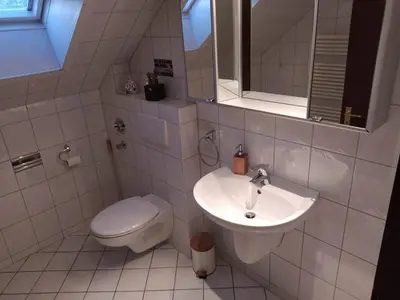 Ein Badezimmer in der Unterkunft City FeWo
