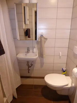 Ein Badezimmer in der Unterkunft Ferienwohnung Bochum-Eppendorf