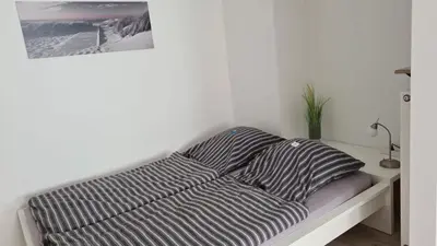 Ein Bett oder Betten in einem Zimmer der Unterkunft Ferienwohnung Poppelreiter