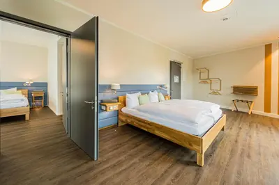 Ein Bett oder Betten in einem Zimmer der Unterkunft Hotel Neues Pastorat