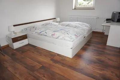 Ein Bett oder Betten in einem Zimmer der Unterkunft Artus Hotel