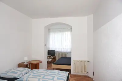 Ein Bett oder Betten in einem Zimmer der Unterkunft Artus Hotel
