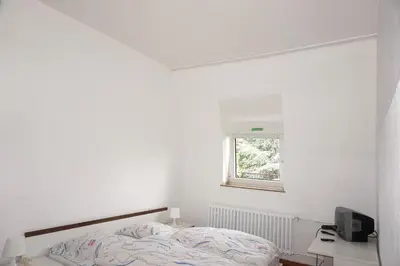 Ein Bett oder Betten in einem Zimmer der Unterkunft Artus Hotel