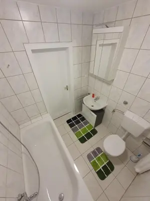 Ein Badezimmer in der Unterkunft Ferienwohnung Schloßstraße