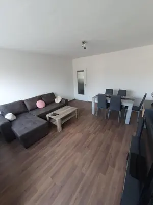 Ein Sitzbereich in der Unterkunft Ferienwohnung Schloßstraße