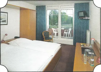 Ein Bett oder Betten in einem Zimmer der Unterkunft Bittscheidt´s Stadthotel