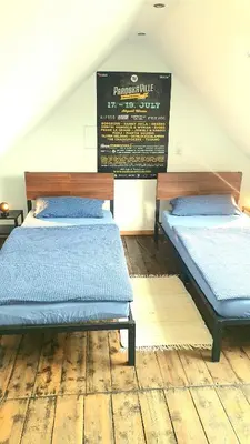 Ein Bett oder Betten in einem Zimmer der Unterkunft FRANKES CITY SLEEP Apartment, 6 Einzelbetten
