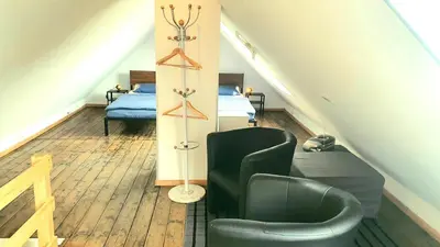 Ein Sitzbereich in der Unterkunft FRANKES CITY SLEEP Apartment, 6 Einzelbetten