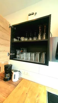 Kaffee-/Teezubehör in der Unterkunft FRANKES CITY SLEEP Apartment, 6 Einzelbetten