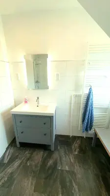 Ein Badezimmer in der Unterkunft FRANKES CITY SLEEP Apartment, 6 Einzelbetten