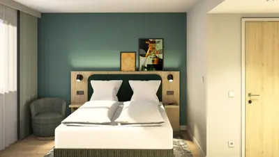 Ein Bett oder Betten in einem Zimmer der Unterkunft Spark by Hilton Essen City Centre