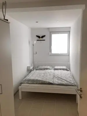 Ein Bett oder Betten in einem Zimmer der Unterkunft Ferienwohnung kleines Zuhause