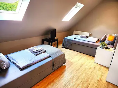 Ein Bett oder Betten in einem Zimmer der Unterkunft Stadt Apartments Solingen
