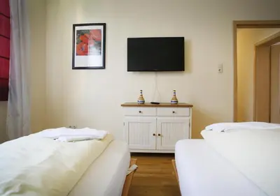 Ein Bett oder Betten in einem Zimmer der Unterkunft Ringeltaube – Wohnen wie zu Hause