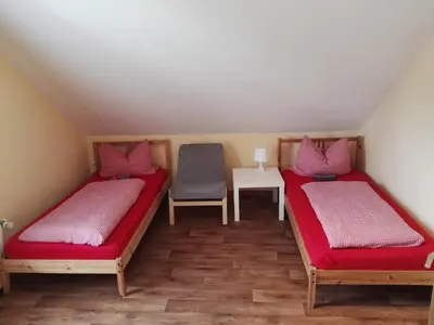 Ein Bett oder Betten in einem Zimmer der Unterkunft Zu Hause Bei Freunden