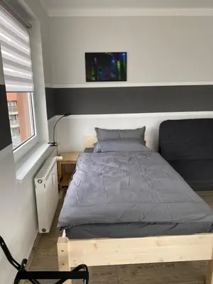 Ein Bett oder Betten in einem Zimmer der Unterkunft Ferienwohnung Hagen