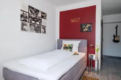 Ein Bett oder Betten in einem Zimmer der Unterkunft art Hotel Körschen