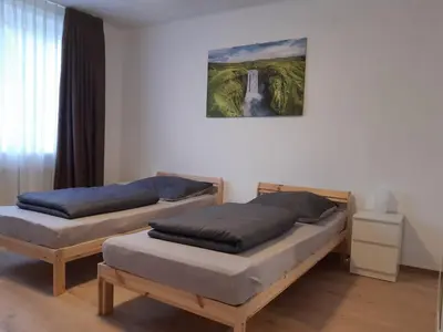 Ein Bett oder Betten in einem Zimmer der Unterkunft Herzmensch Oberhausen