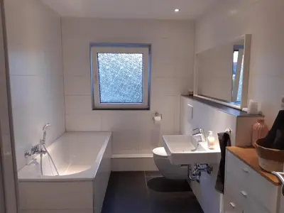Ein Badezimmer in der Unterkunft Herzmensch Oberhausen