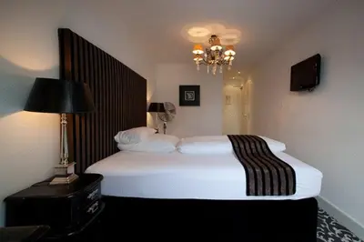 Ein Bett oder Betten in einem Zimmer der Unterkunft Hotel Aleksandra